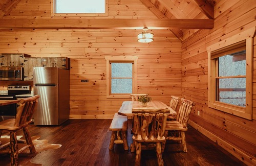 Rockbridge Cabin | The Hilltop - The Hilltop at Pine Creek Cabins and Camping in Hocking Hills, just minutes from Hocking Hills State Park. A cozy, yet spacious, pet-friendly cabin perfect for a reset surrounded by nature! Book your getaway today!