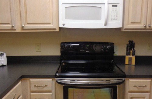 Dauphin Island Condo | The Inn at Dauphin Island 102 Walk right out to Pools and Beach!