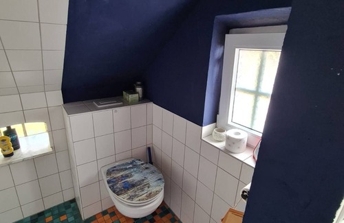 Holtgast Cabin | The Kirsche - Rustic sleeping barrel in East Frisia