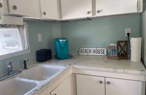 Cape Cay House | The Little Otter Pup: A Hidden Gem of Cape Cay