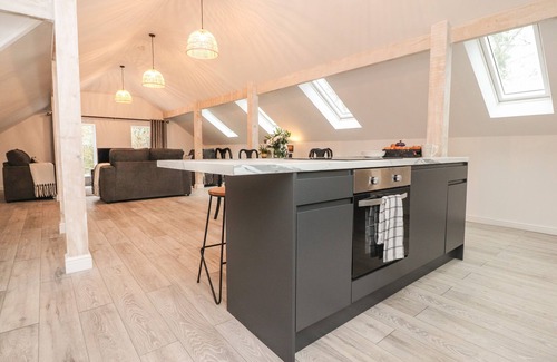 Whalley Cottage | THE LODGE AT BRIDGEWAY, pet friendly, with a garden in Whalley