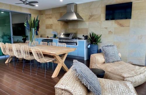 Mudjimba House | The Palm - Beachside Home with Heated Pool, Cinema & Games Room