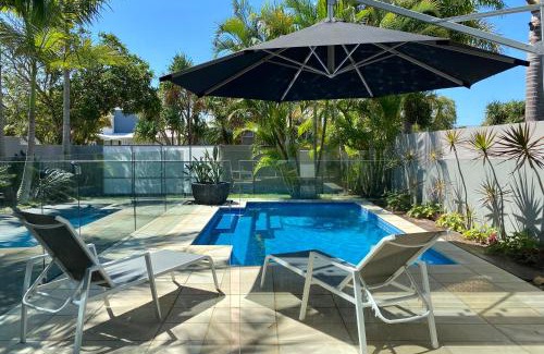 Mudjimba House | The Palm - Beachside Home with Heated Pool, Cinema & Games Room