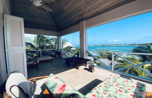 Green Turtle Cay Apartment | The Penthouse with sweeping views of Cocoa bay beach , green turtles & Rays