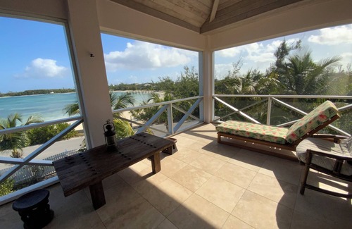 Green Turtle Cay Apartment | The Penthouse with sweeping views of Cocoa bay beach , green turtles & Rays