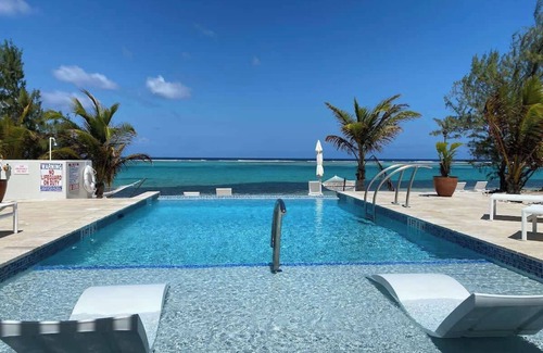 Colliers Bay Condo | The Starfish Oceanfront Studio Cottage in East End