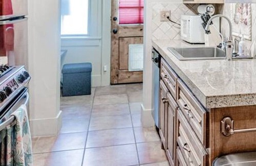 Maple Ridge Apartment | The Teak Follow, beautiful brick enclosed space
