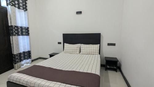 Ella House | The Village - Ella