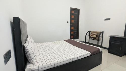 Ella House | The Village - Ella