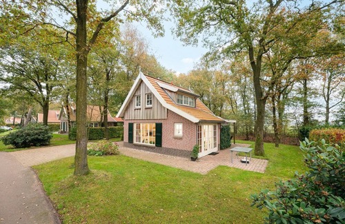 Wierden House | This comfortable luxury villa with covered terrace is located on the vacation complex Buitengoed Het Lageveld.