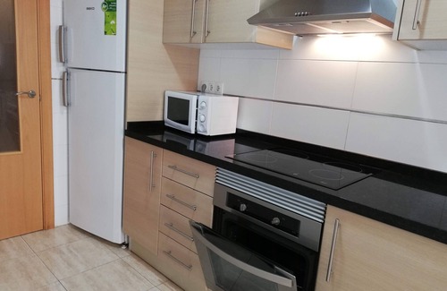 Xeraco Beach Apartment | Three bedrooms, garage, pool and large terrace with awnings!
