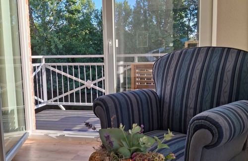 Eilsum Apartment | TiefBlick - New 80sqm apartment for 4 pers. + 2 dogs with fireplace, balcony &