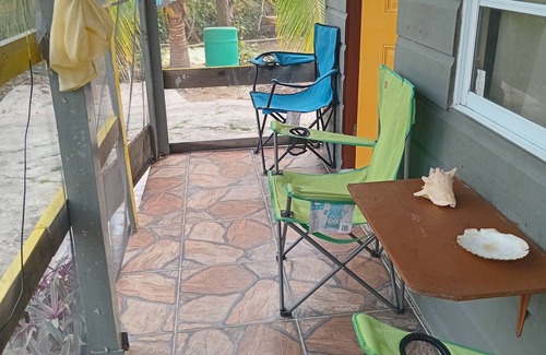Negril Cabin | Tiny House 2 -bedroom Cabin with AC, WiFi, Close to beach and more in Negril JM.