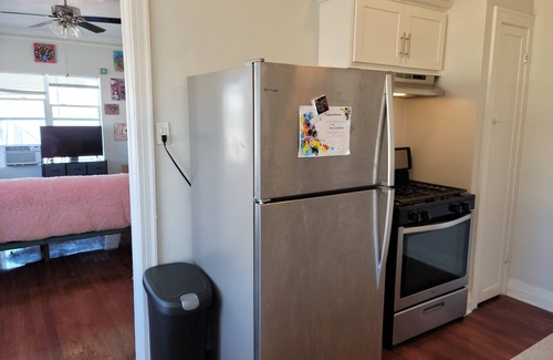 Rampart Village Apartment | Top floor rental unit with view of Hollywood sign