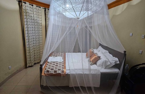 Fort Portal Cabin | Top of the World Lodges Fort Portal