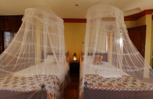 Fort Portal Cabin | Top of the World Lodges Fort Portal