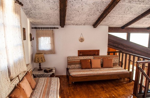 Paleros Villa | Traditional, rustic, seafront villa, just steps away from the beach.
