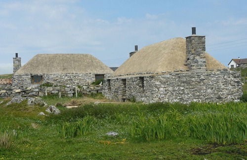 Outer Hebrides Cottage | Traditional stone and thatch cottage on the waters edge with beautiful sea views