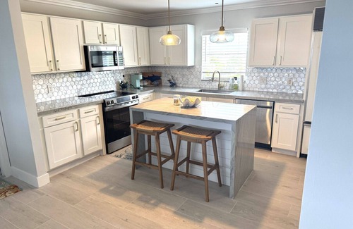 Marathon House | Tranquil 4-bedroom Pool Home, Open-Water Views w/Dock in Duck Key