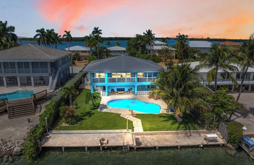Marathon House | Tranquil 4-bedroom Pool Home, Open-Water Views w/Dock in Duck Key