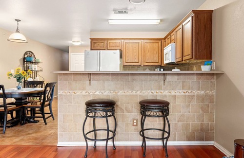 New Braunfels Condo | Tranquil Cozy Riverfront Condo | Guadalupe River Access | Pools & Hot Tubs | Walk to Schlitterbahn