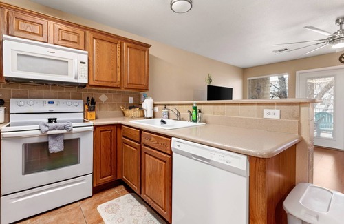 New Braunfels Condo | Tranquil Cozy Riverfront Condo | Guadalupe River Access | Pools & Hot Tubs | Walk to Schlitterbahn