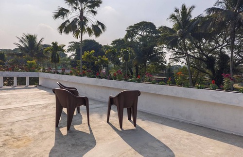 Jorhat House | Tranquil Greenery Meets Urban Convenience