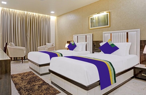 Nagpur Hotel | Treebo Premium Golden Bliss Trimurti Nagar Square