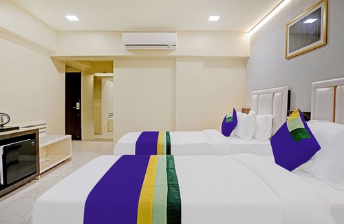 Nagpur Hotel | Treebo Premium Golden Bliss Trimurti Nagar Square