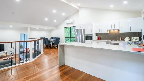 Hardys Bay House | 'Treetops On The Bay - Water Views' by HolidayCo