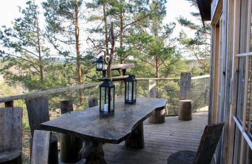 Halden Ski Chalet | Tretopphytter På Grensen - Elghytta med robåt og gjeddefiske