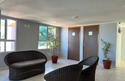 Cabo Branco Hotel | Triple suite with side sea view