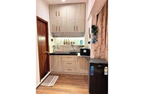 Arpora Apartment | Tropical Charm by Boho- Forest View>Pool & Kitchen