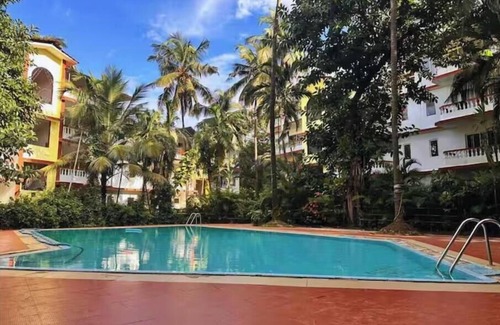 Arpora Apartment | Tropical Charm by Boho- Forest View>Pool & Kitchen