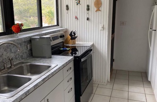 Christiansted Condo | Tropical Escape! Condo on the Golf course-Ocean View - Beach-Pool-Tennis