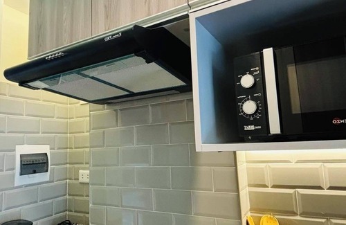 Mactan Export Processing Zone Condo | Tropical Penguins At Amani Near The CEB Airport