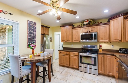 Rustic Oaks House | Tropical Retreat near beaches with amazing Pool, Cabana, Hot Tub & Patio areas!