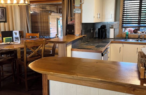 Sooke Cabin | True West Coast experience custom log home with sauna & outside cedar soaker tub