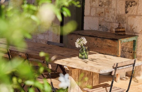 Ostuni Villa | Trullo di Luna, refined trullo with enchanting pool surrounded by nature