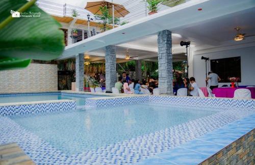 Lemery Hotel | TUBURAN Poolside