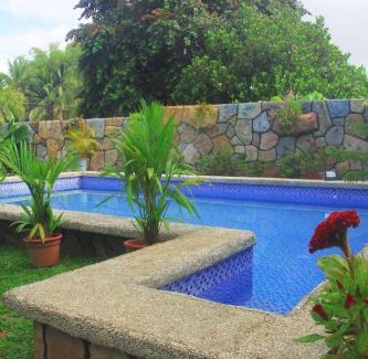 Lemery Hotel | TUBURAN Poolside