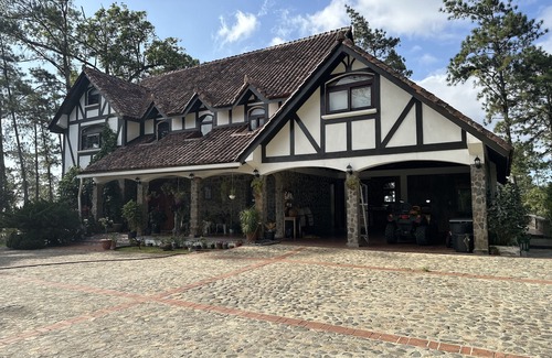 Cerro Azul House | Tudor Mountain Retreat