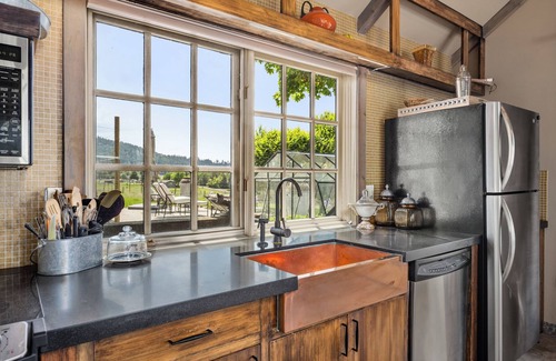 Spokane Villa | Tuscany Styled Open Beamed Retreat on South Hill with Gorgeous Mountain Views