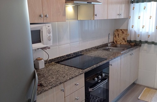 Xeraco Beach Apartment | Two bedrooms on the ground floor, patio with barbecue, swimming pool and tennis court.