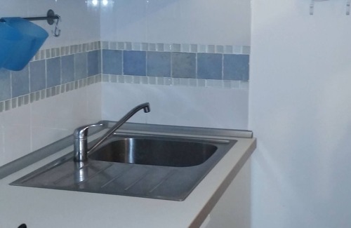 Tancau Sul Mare Apartment | Two-room apartment 300 meters from the sea in a villa with garden (IUN FO 665)