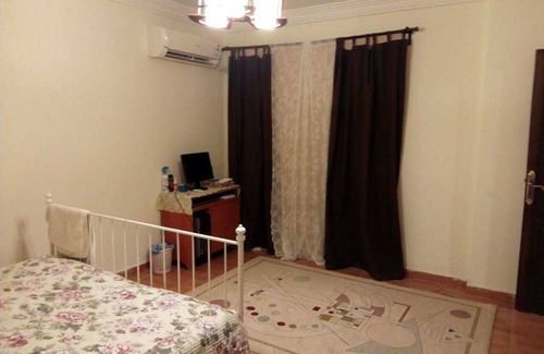 Qasr an-Nil Bed & Breakfast | Two rooms at PALM CITY in a spacious and bright apartment