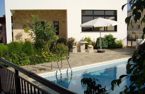 Kissonerga Apartment | Two very large, bright apartment with private garden, pool and grill