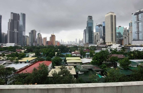 Valenzuela Condo | Ultimate Staycationnw/Jacuzzi and Arcade