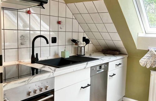 Dornum Apartment | Unwind at the swimming pond