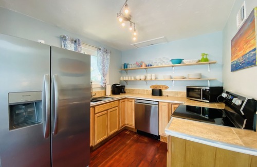 New Smyrna Beach House | UP TO 2 COTTAGES AVAILABLE, PRIVATE POOL, COURTYARD, STEPS FROM FLAGLER AVE.